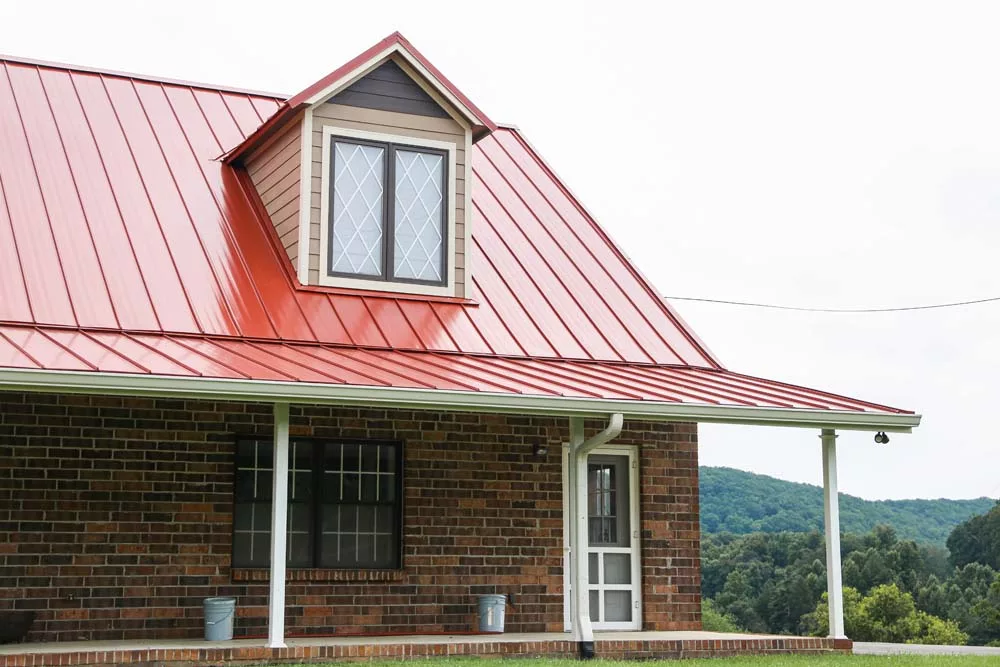 Red metal roof on home