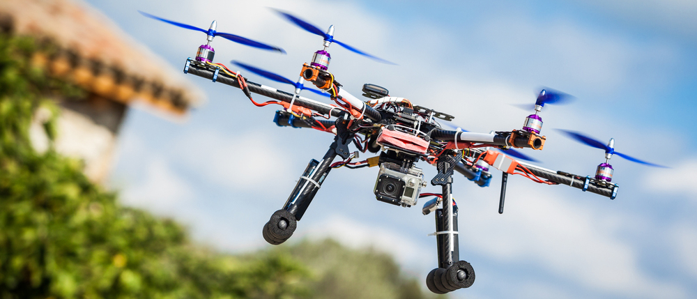 Drone with tile roof in background