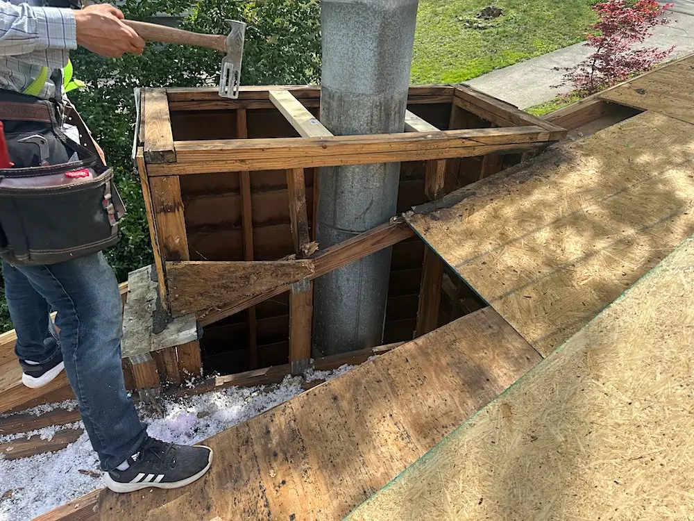Man fixing a damaged chimney in Knoxville