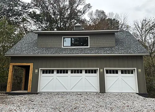 Knoxville garage with James Hardie sidinhg painted in moss green