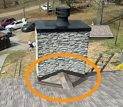 a cricket shown protecting a Sweetwater home's chimney
