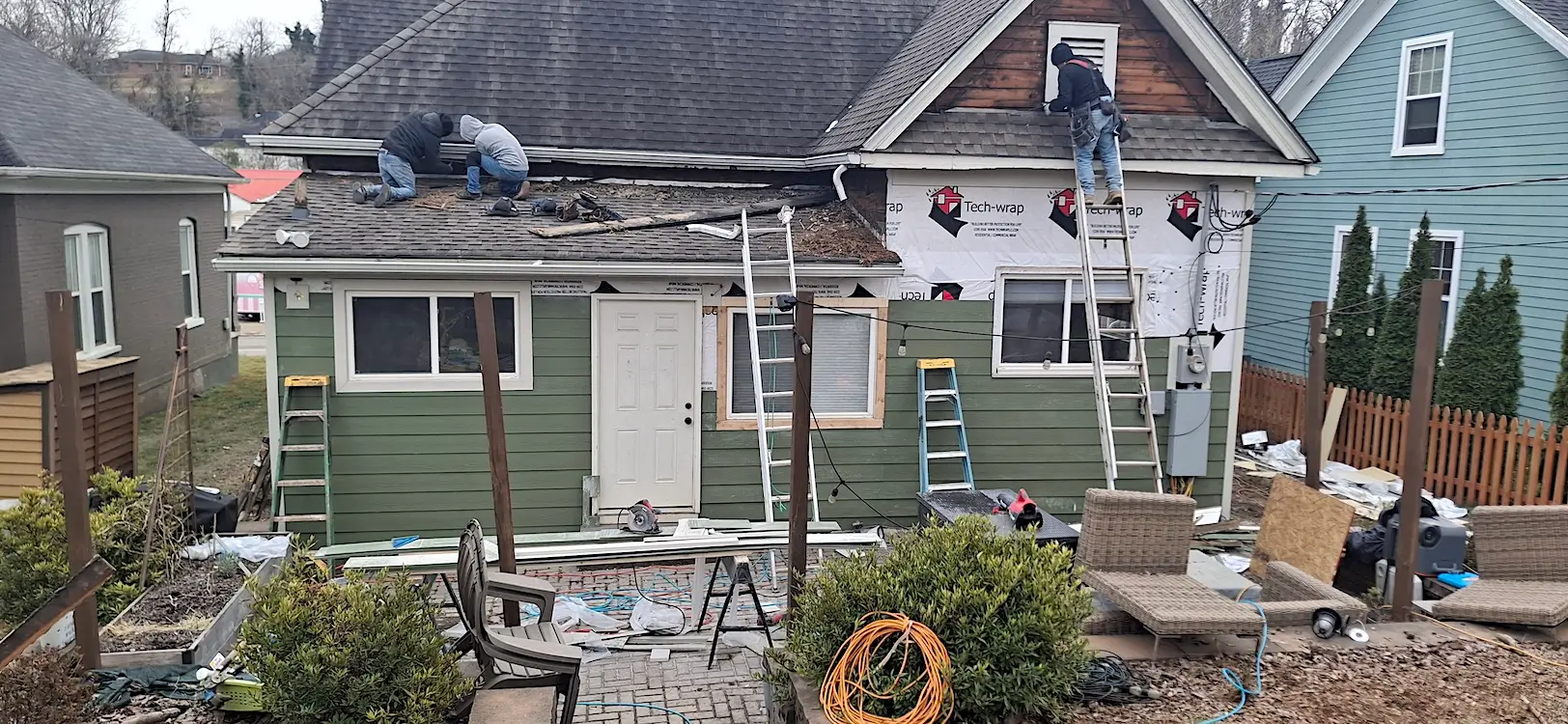 Old multi-level wood deck in Sevierville TN as viewed from below showing weathered framing and cross-bracing before replacement.