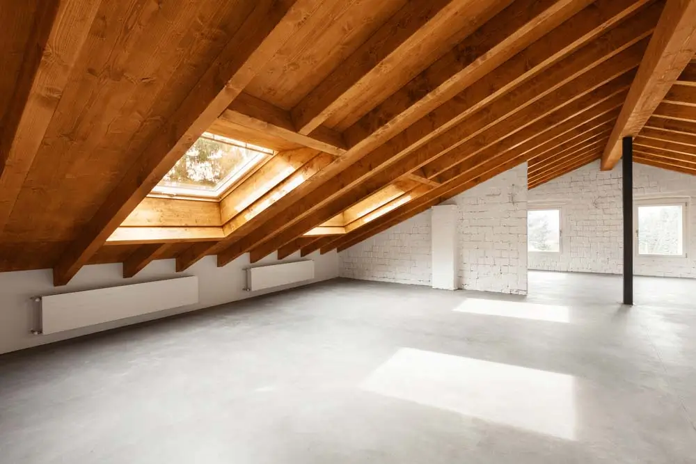 the attic of a house with a skylight